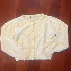 Coquette sweater with hearts and pearl buttons